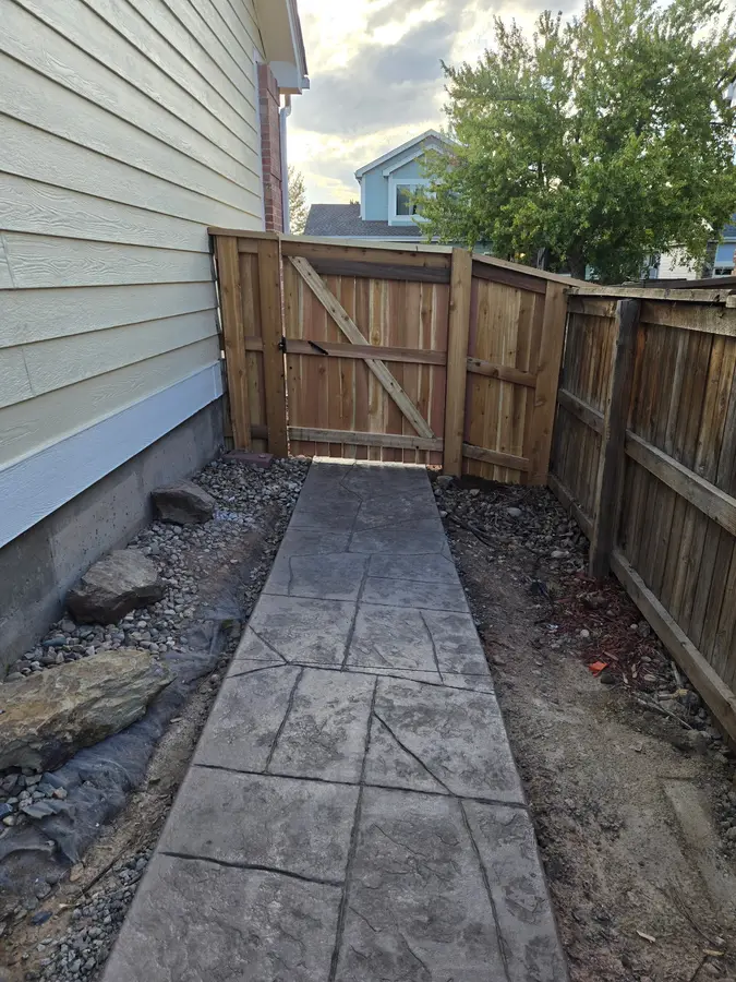 Existing gate and adjoining fence section