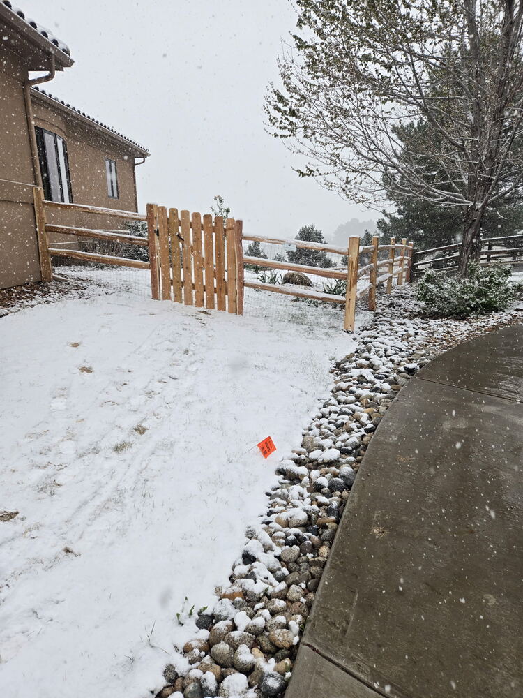 3-rail split rail fence with spaced picket gate built by The Fence Lady Co.